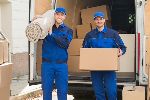 Team handling removals to Scotland with care during packing