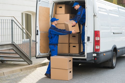 Packed boxes and furniture ready for a house move in Toscotland
