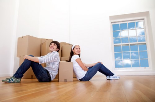 Unpacking boxes into the correct rooms after a move in Toscotland