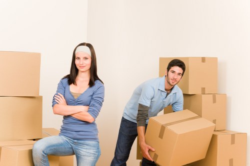 Prepared boxes and wrapped furniture inside a property before a move