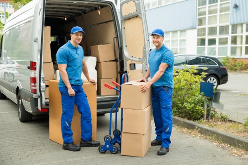 Local movers helping a family settle into a new home with unpacking support