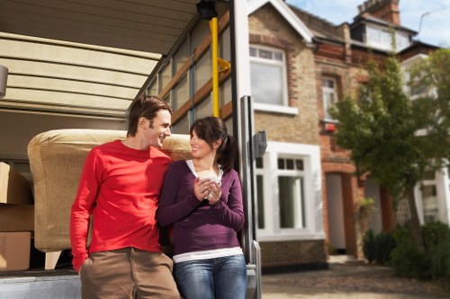Mover reviewing a booking checklist and service details